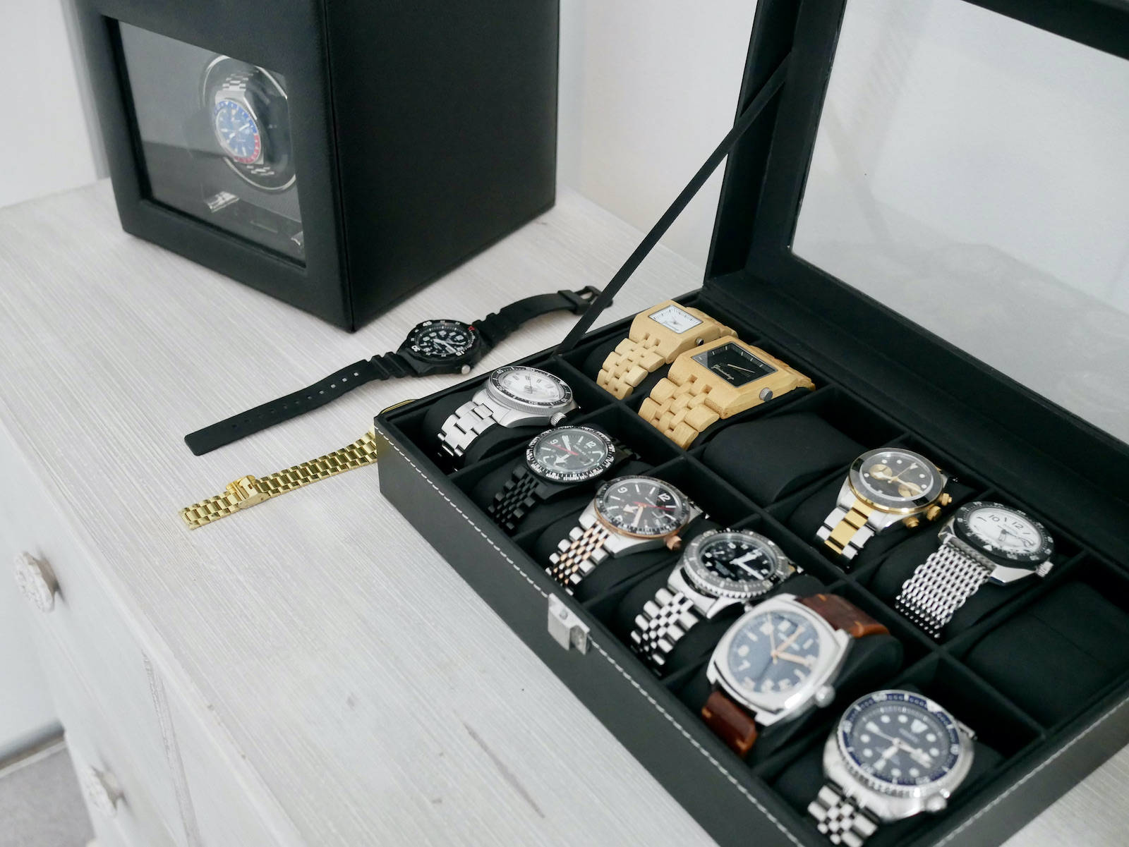 A personal collection of watches neatly arranged. A growing addiction?